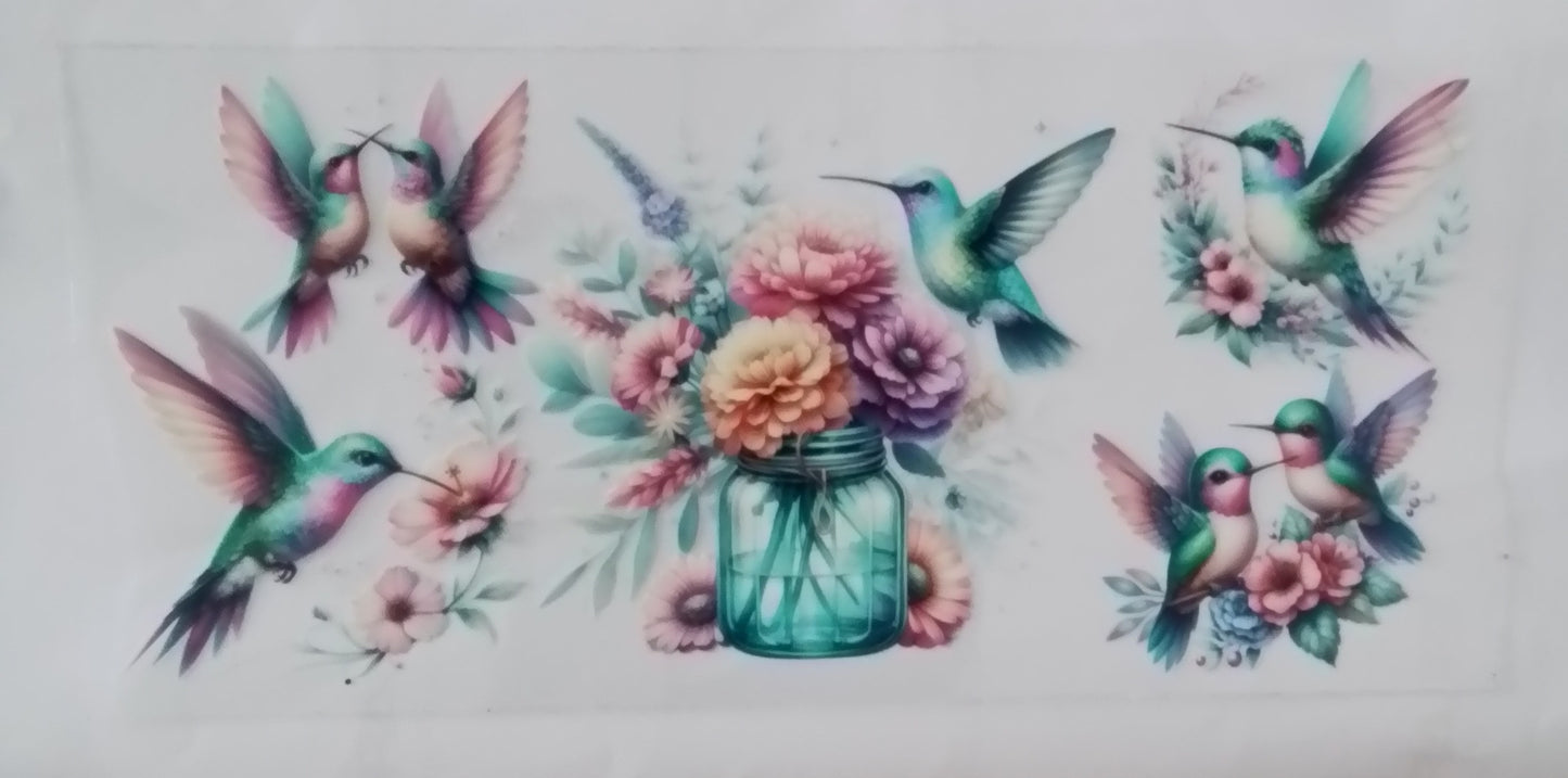 B005 - Humming bird with vase/ not for sale on there own to be purchased with snow globe