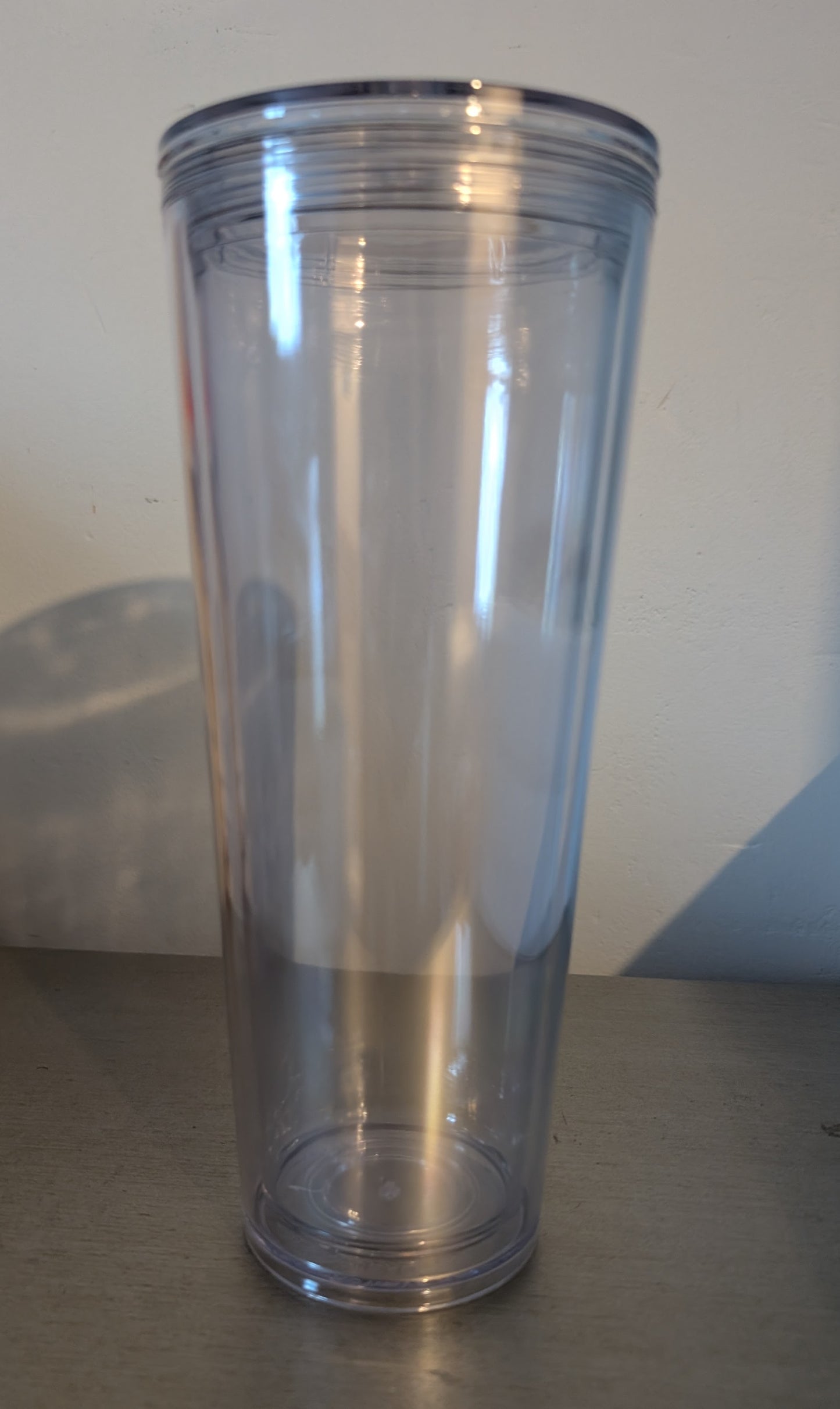 24 oz Acrylic snow globe, to be competed on the live